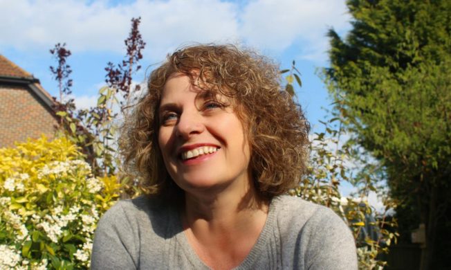 A picture of Dawn outside smiling