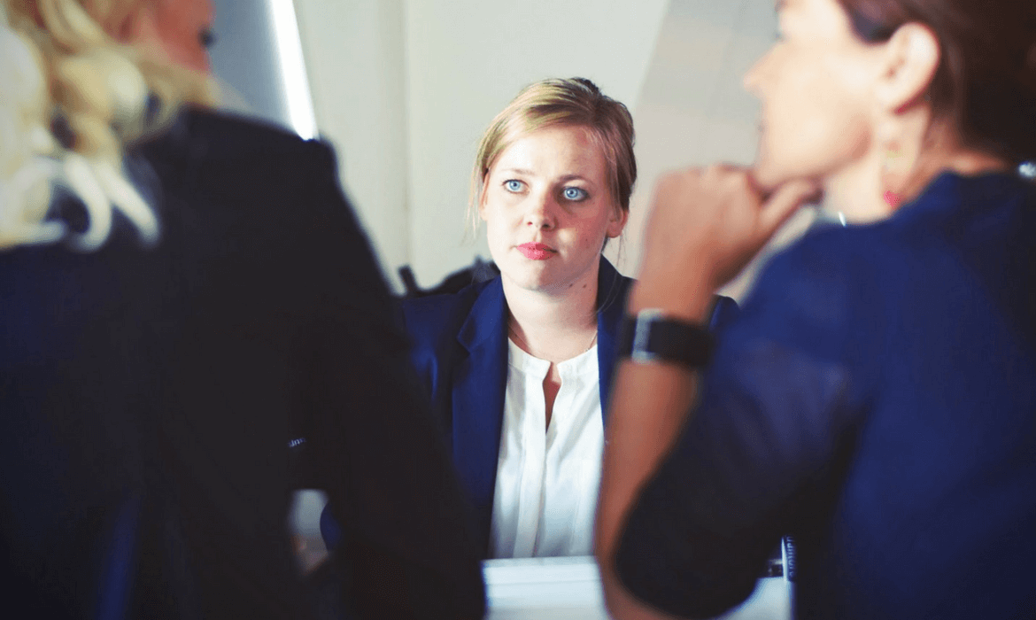 People sitting at a table for a meeting